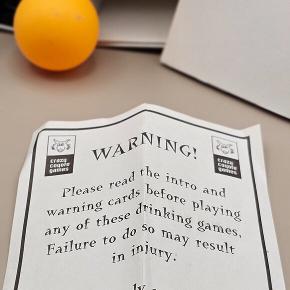 Utterly Outrageous Drinking Games bottle shaped tin box with 25 games dated 2007 - Picture 10 of 14